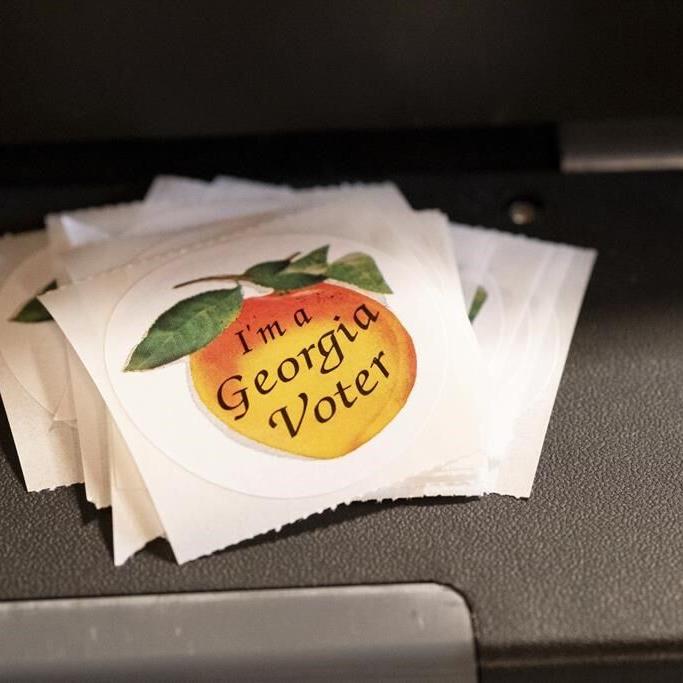 How Georgia's Senate runoff between Walker and Warnock works